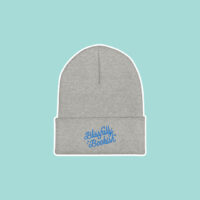 grey and teal blissfully bookish beanie on blue background