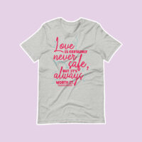 grey tee shirt with dark pink text design on purple background
