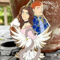 fiction flames pin sitting against a pot on a table